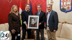 Capellán honra a Eduardo San Vicente por su reconocimiento con la Medalla de Oro de la Confederación Española de Fotografía.
